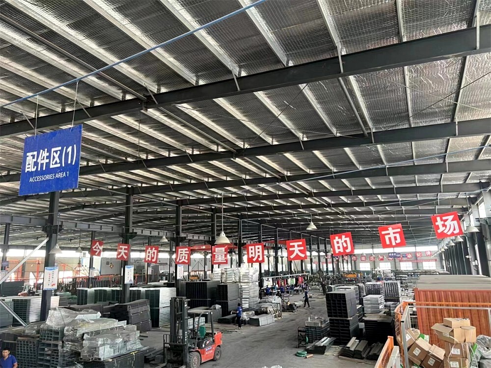 Accessories area inside the Hongfeng factory with fittings and hardware stock