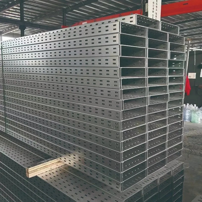 Finished perforated cable trays stacked at the factory