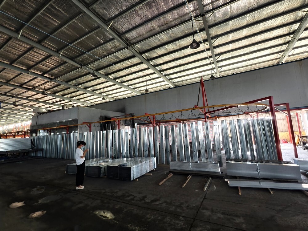 Galvanized trays on the hanging line for surface treatment