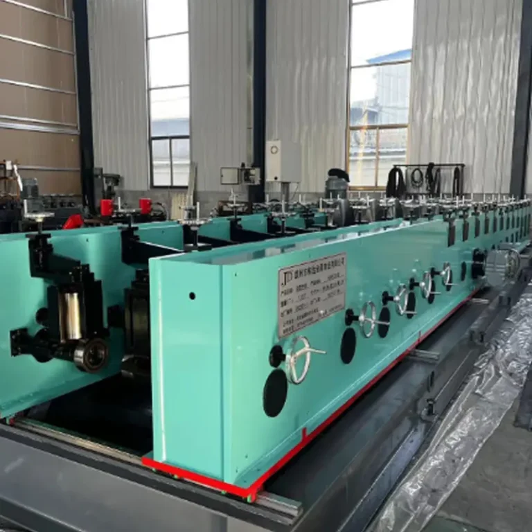 Roll forming line shaping steel strip into tray profiles